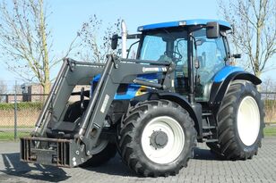 tracteur à roues New Holland TS135A | 4X4 | 40 KM/H | FRONT LOADER | AIRCO